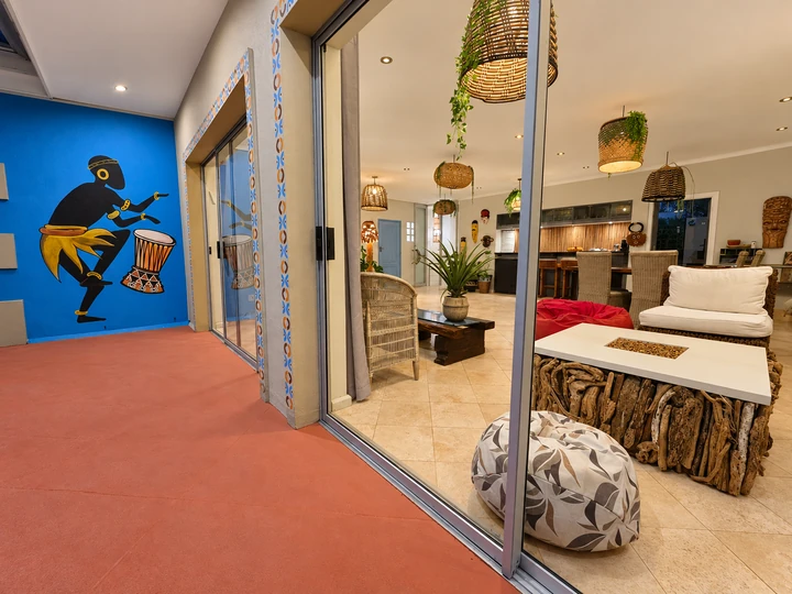 Communal terrace and glass doors opening to the lounge