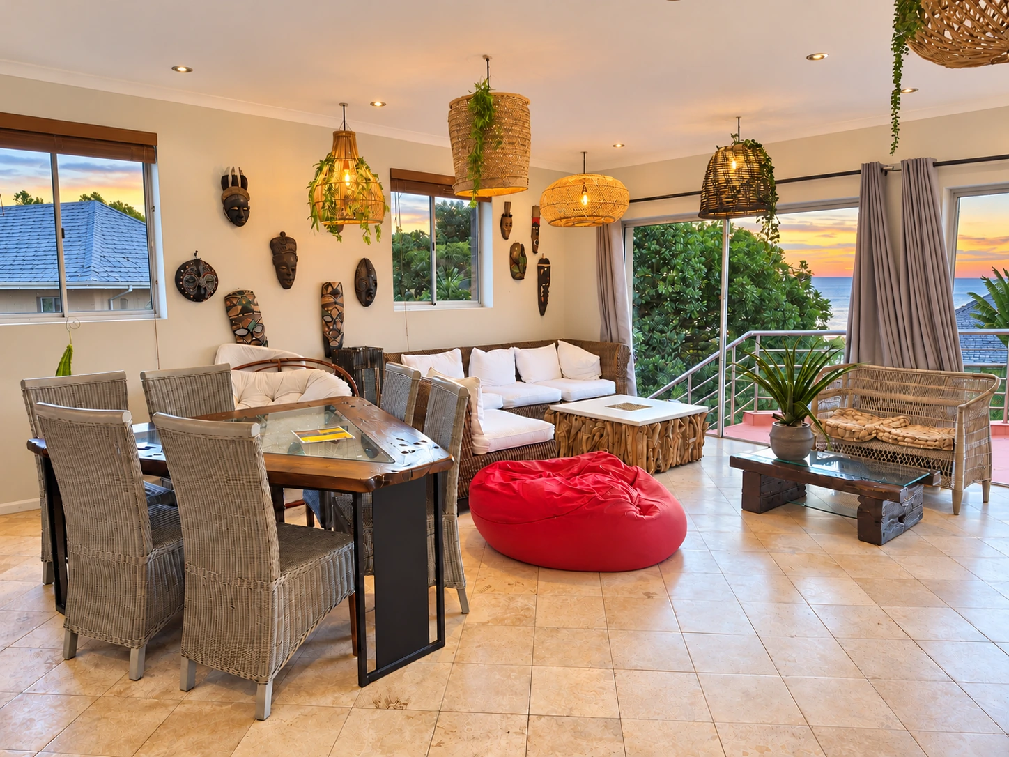 Lounge and dining area with an Atlantic sunset outlook