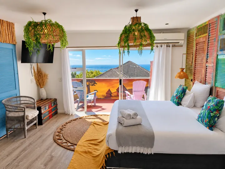 Bedroom with colourful shutters